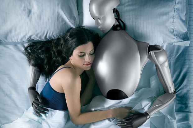 Sex robot. Woman in bed with robot